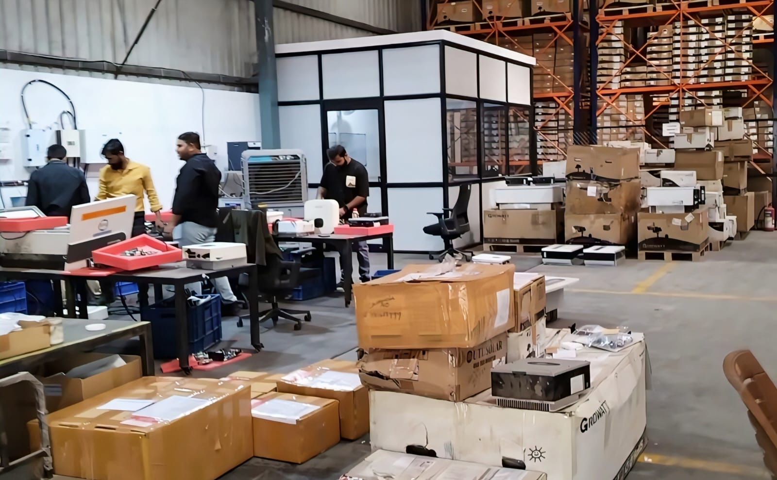 Gajra New Energy service area with repair tables and warehouse stock