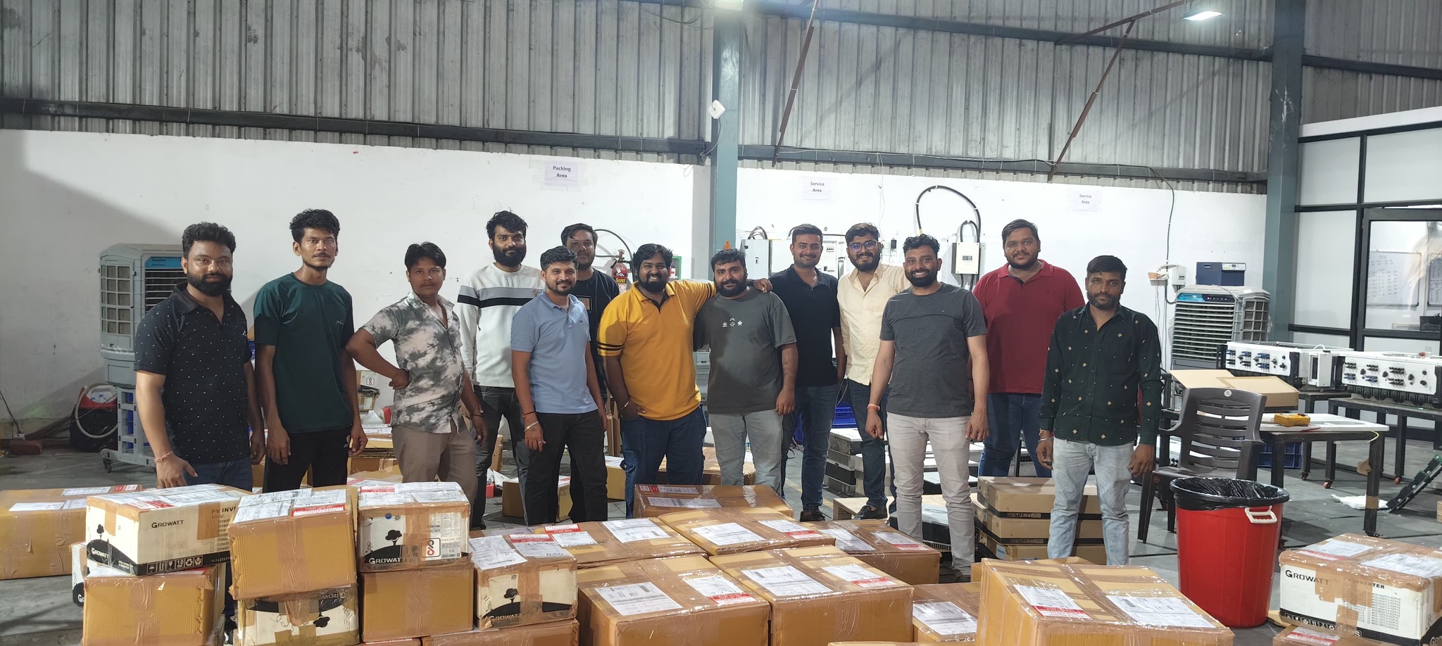Gajra New Energy team standing together in the service and warehouse area